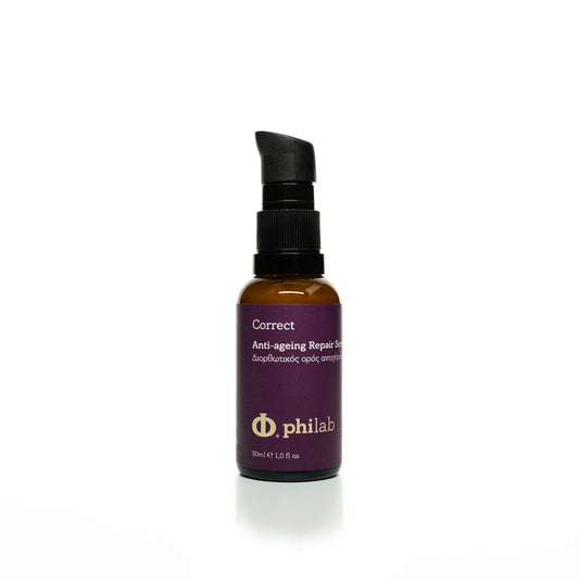 Philab Correct Anti-ageing Repair Serum in amber bottle with black pump on white background.